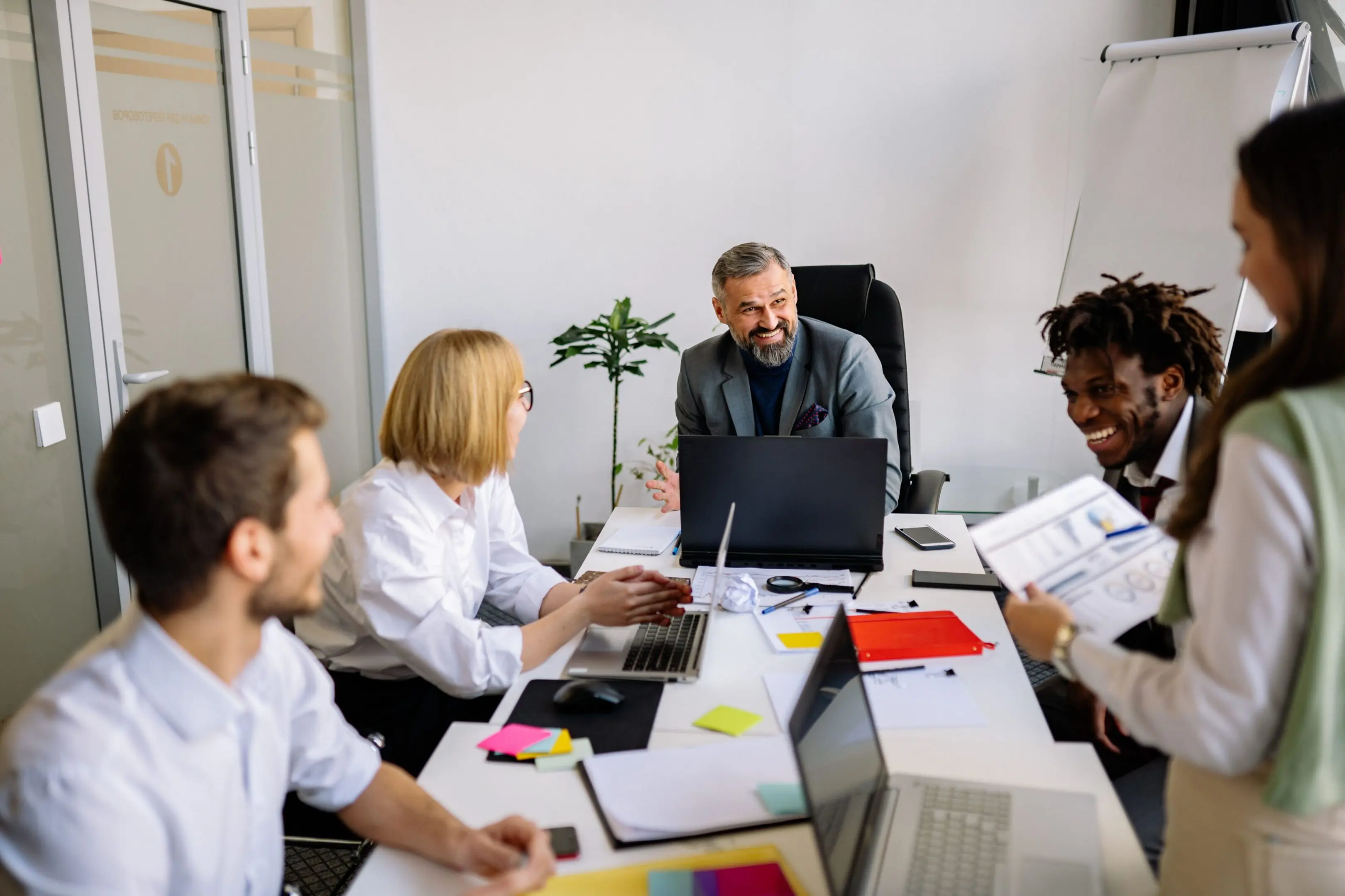 Colleagues collaborating at a conference table