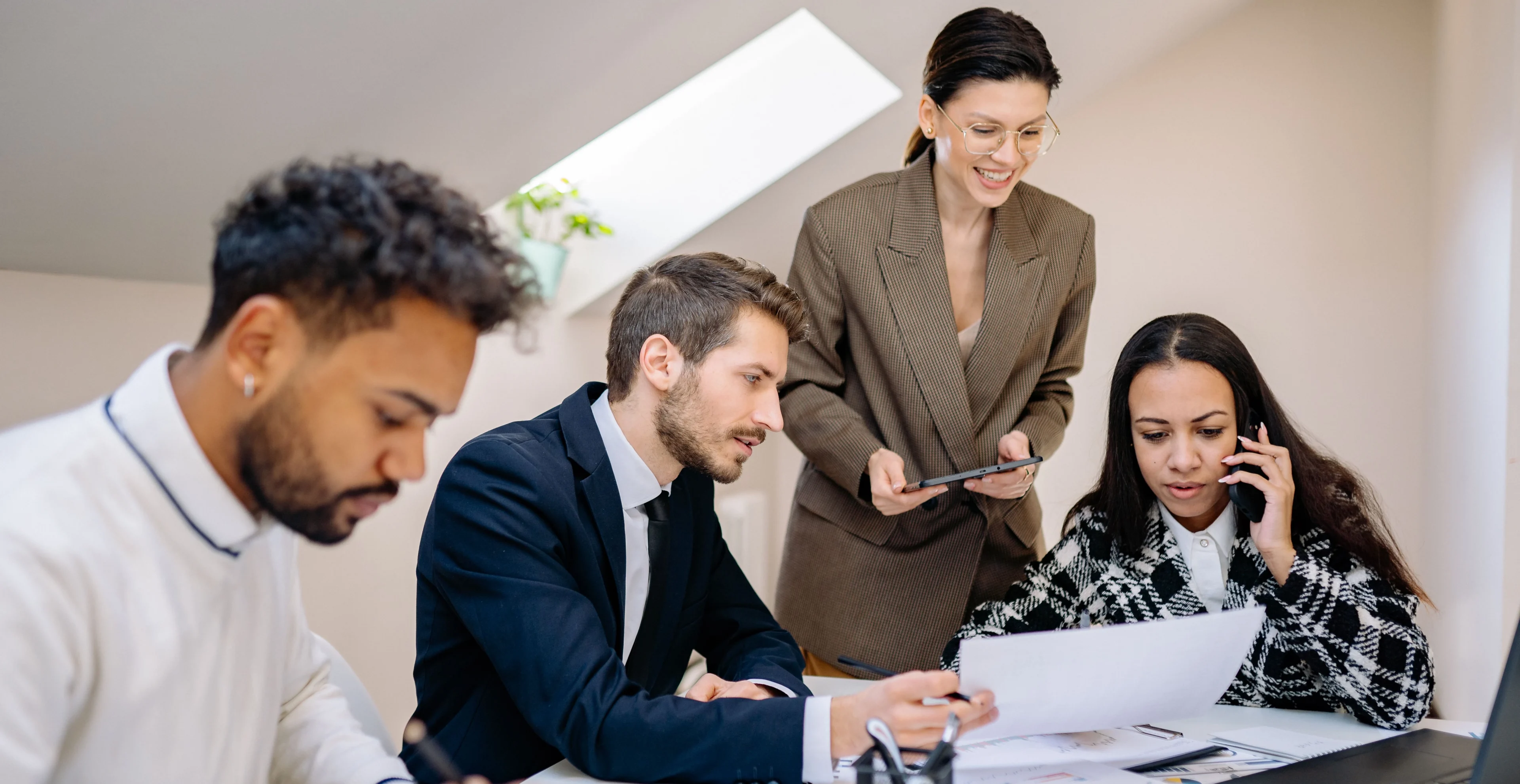 Professionals reviewing documents together